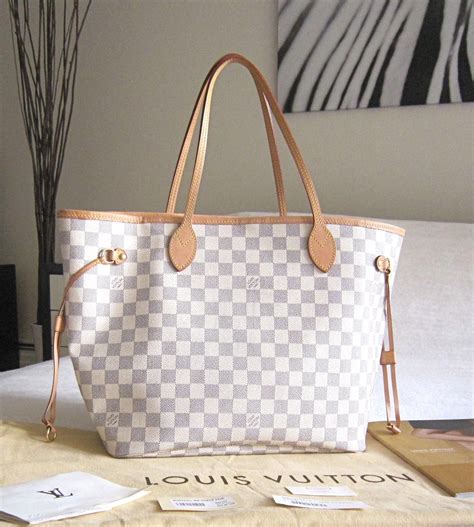 louis vuitton white neverfull bag|louis vuitton neverfull pouch new.